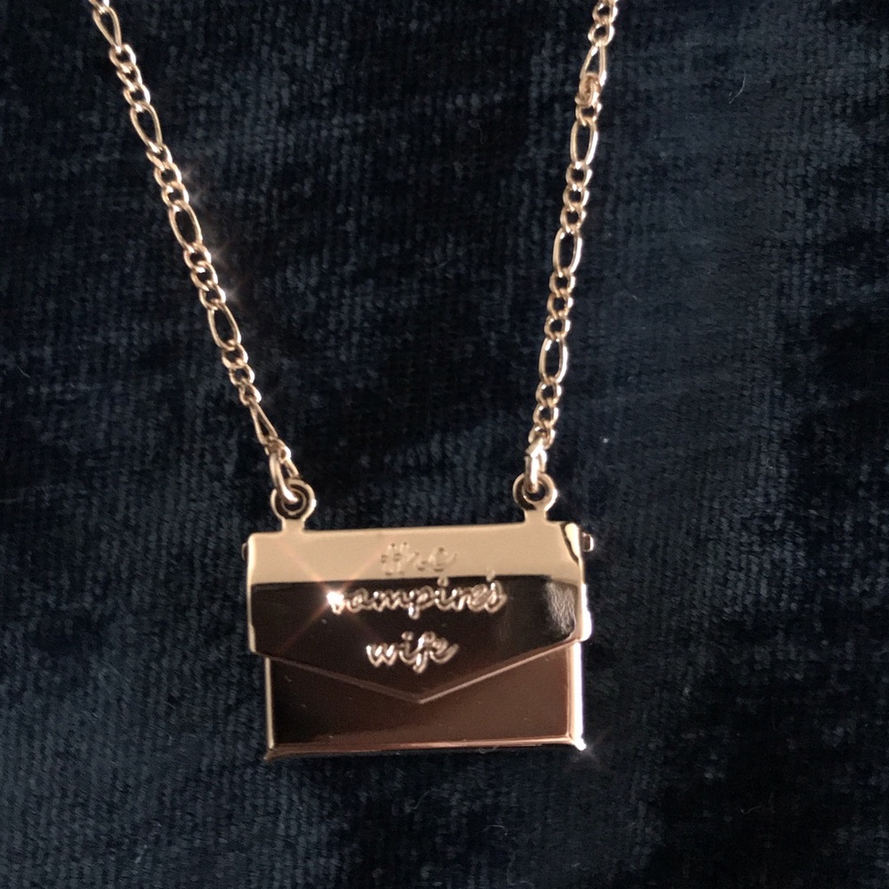 The Vampire’s Wife gold envelope necklace